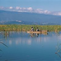 lago-enriquillo---fishermen-on-a-boat,-barahona